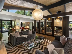 Lizzo pays $12.4 million for Jeremy Renner's L.A. pad.